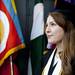 Carly Gertler looks out into Michigan Stadium from the tunnel before carrying a flag during Spring Commencement on Saturday, May 4. Daniel Brenner I AnnArbor.com